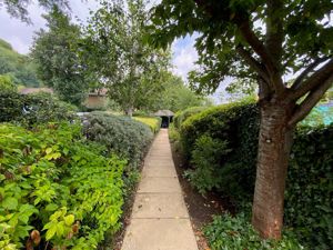 PATH FROM BUILDING TO PERGOLA- click for photo gallery